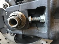 Rear Axle Nut and right adjustment bolt