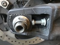 Rear Axle Nut and right adjustment bolt - loosened